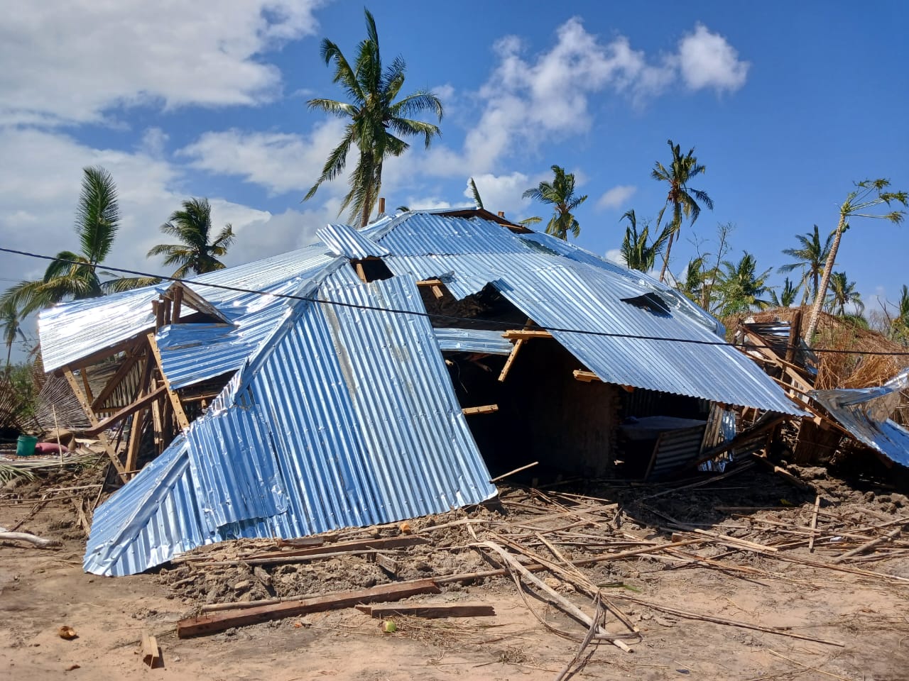 Ødelagt hus i Mozambique